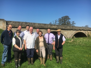 Rebecca with local farmers